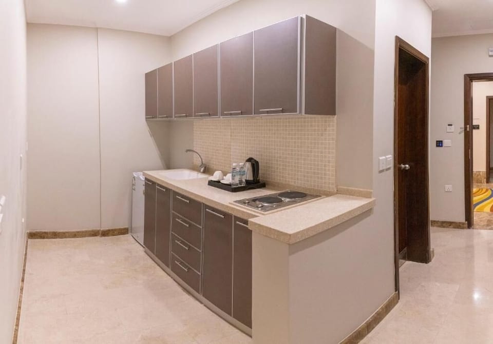 Mini-fridge, microwave, cookware/dishes/utensils
