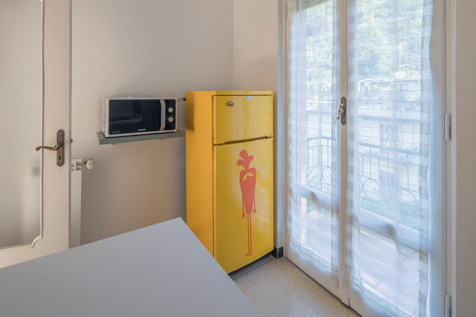 Apartment, Sea View | Private kitchen | Full-size fridge, microwave, dishwasher, cookware/dishes/utensils