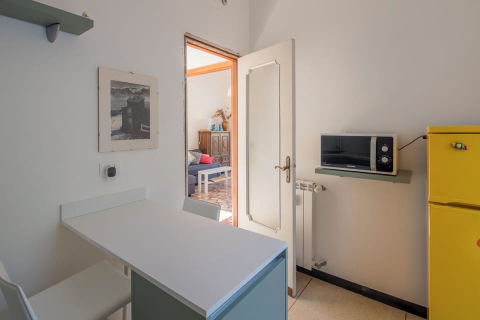 Apartment, Sea View | Private kitchen | Full-size fridge, microwave, dishwasher, cookware/dishes/utensils