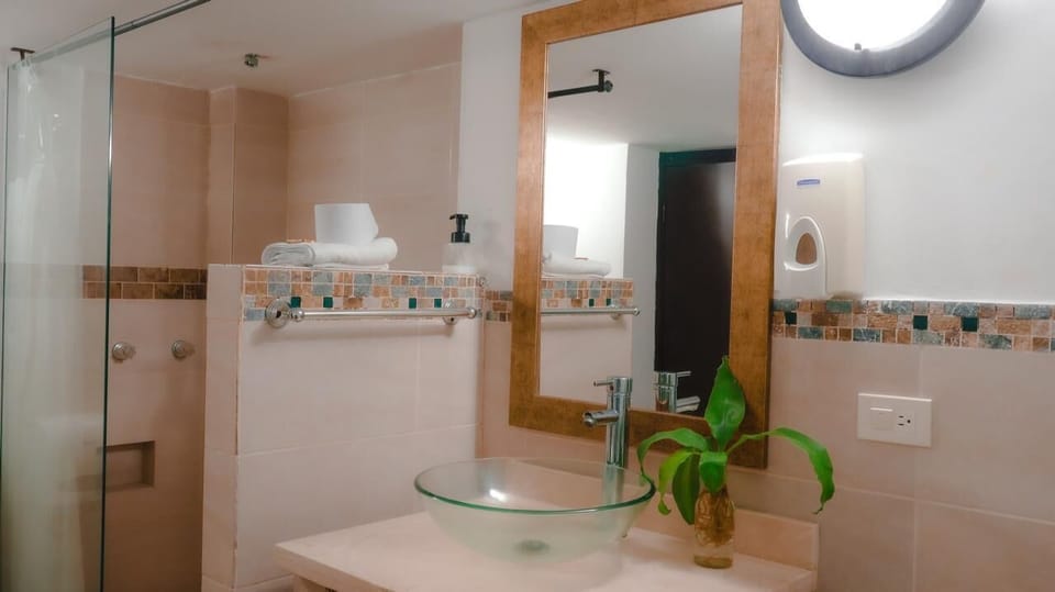 Standard Room | Bathroom | Shower, towels, soap, shampoo