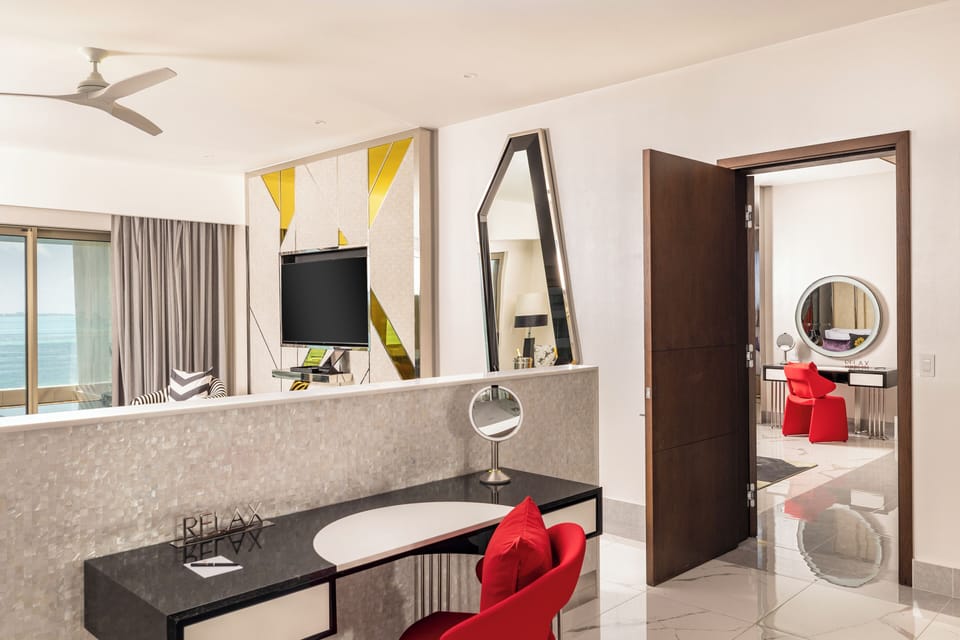 Premium bedding, down comforters, minibar, in-room safe