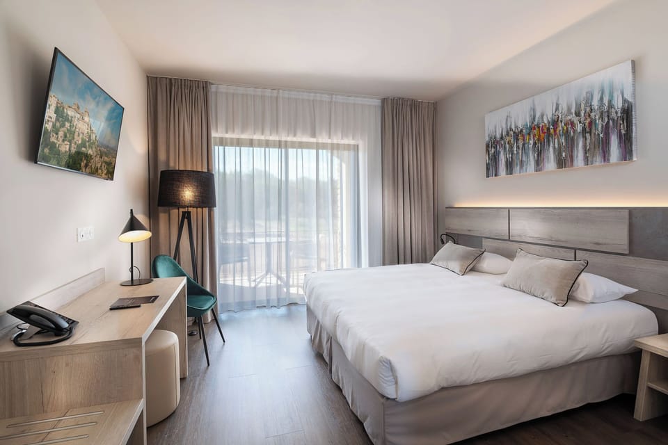 Premium Double Room | Minibar, in-room safe, individually decorated, individually furnished