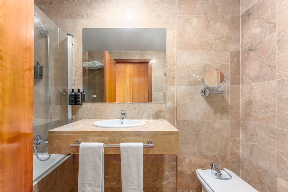 Double Room, City View | In-room safe, desk, free WiFi, bed sheets