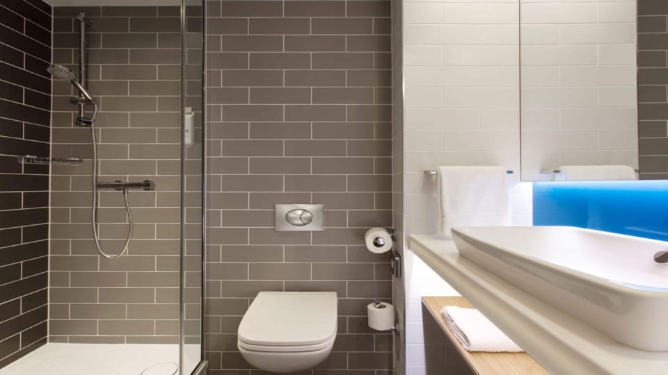 Shower, free toiletries, hair dryer, towels