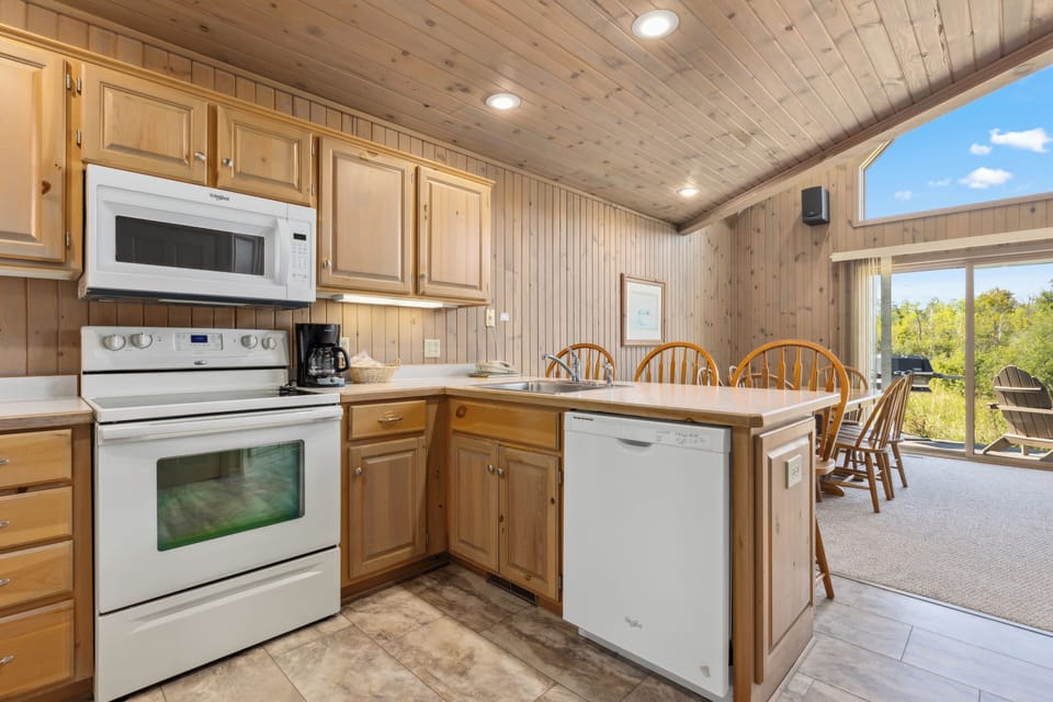 Family Cabin, 2 Bedrooms | Private kitchen | Microwave, coffee/tea maker, toaster, cleaning supplies