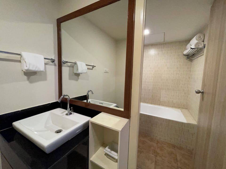Shower, free toiletries, towels, soap