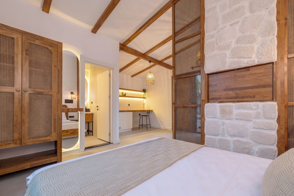 Junior Suite, Pool View | Hypo-allergenic bedding available, down comforters, minibar, desk