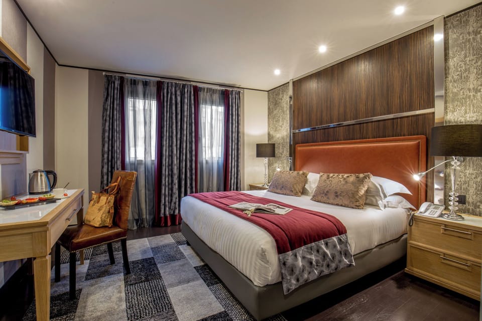 Down comforters, memory foam beds, in-room safe, desk