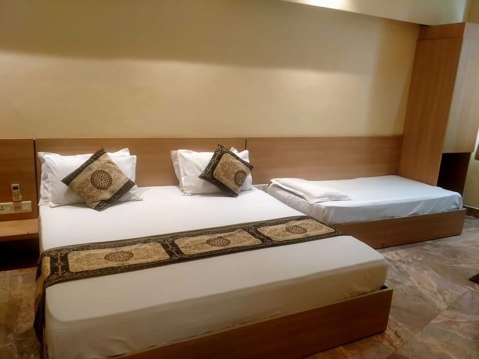 Executive Triple Room, City View | In-room safe, individually furnished, desk, laptop workspace