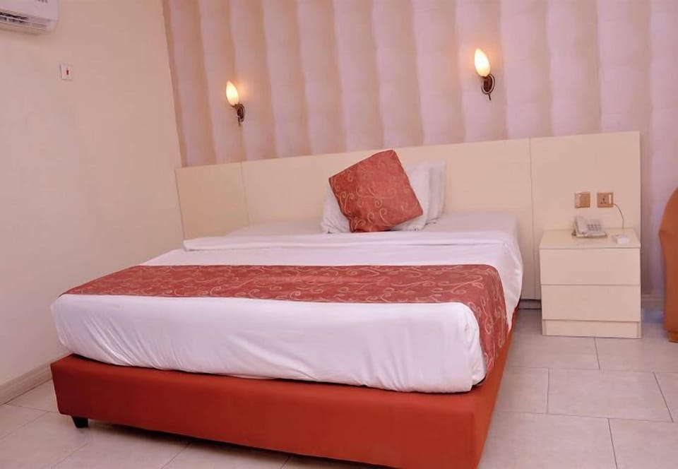 Economy Room, Balcony, City View | Desk, laptop workspace, free WiFi
