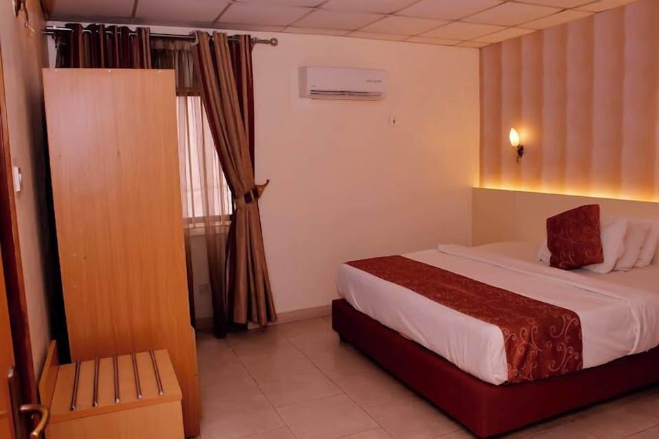 Economy Room, Balcony, City View | Desk, laptop workspace, free WiFi