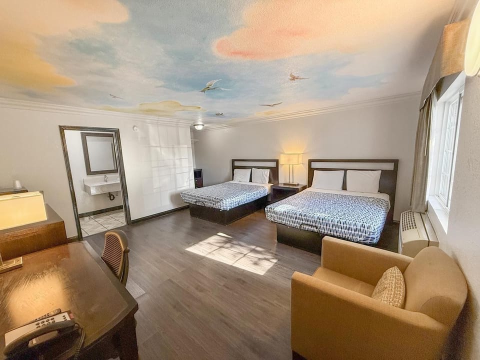 Standard Double Room, 2 Queen Beds | Desk, laptop workspace, free WiFi, bed sheets