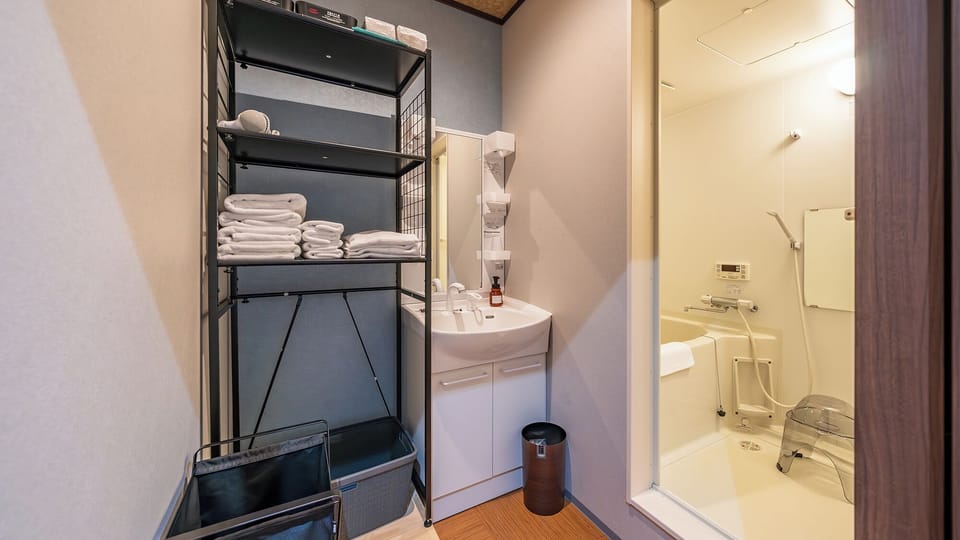 Standard Quadruple Room | Bathroom | Combined shower/tub, hair dryer, bathrobes, towels