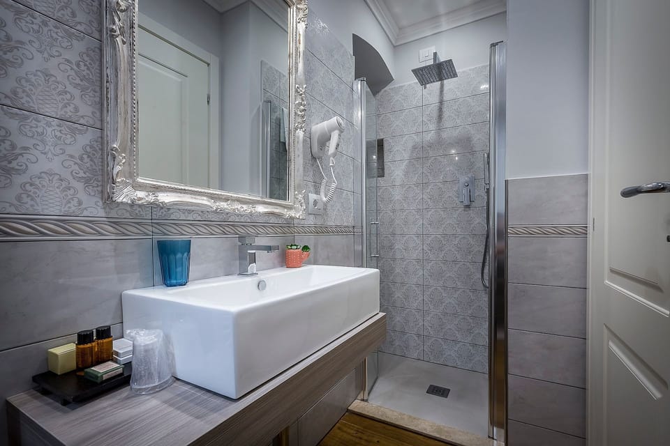 Standard Double or Twin Room | Bathroom | Shower, free toiletries, hair dryer, slippers