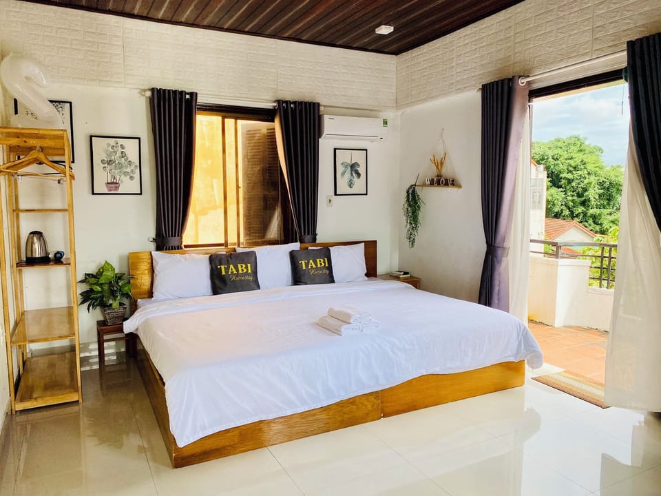 Deluxe Double Room, Balcony | Desk, laptop workspace, iron/ironing board