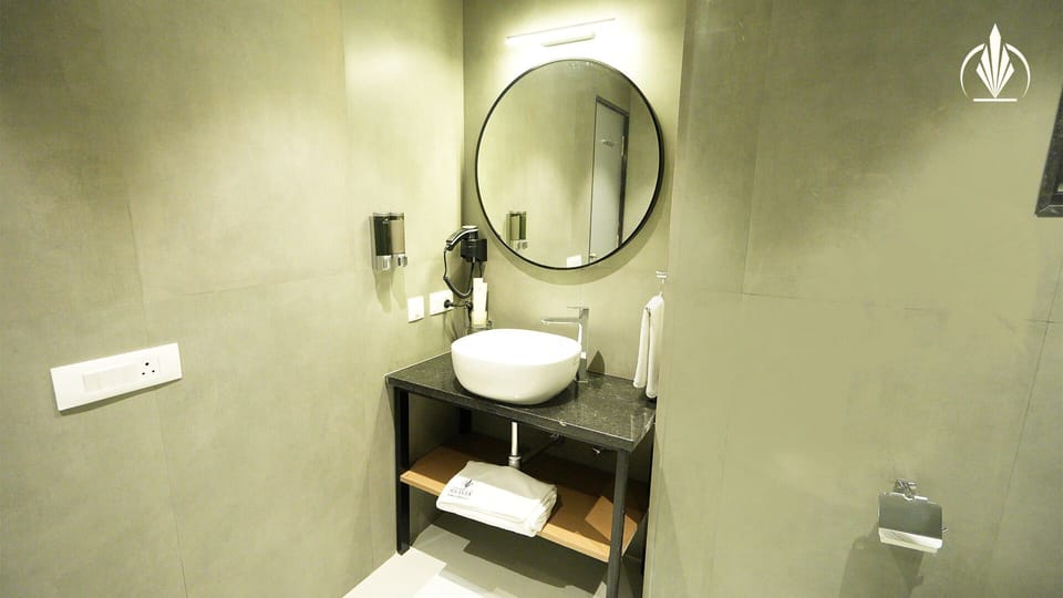 Shower, rainfall showerhead, hair dryer, towels