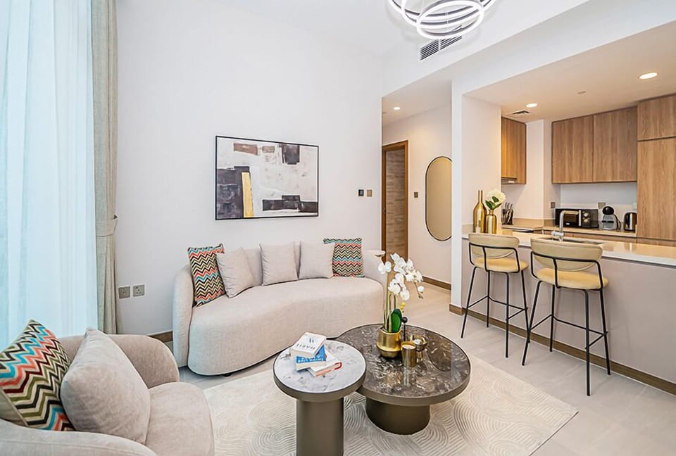 Deluxe Room, Balcony, City View | Living area | 55-inch Smart TV with digital channels