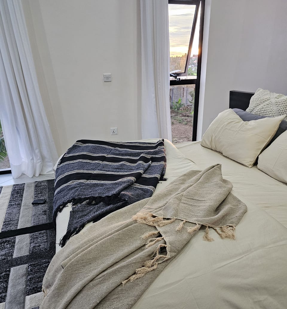 Desk, laptop workspace, blackout drapes, iron/ironing board