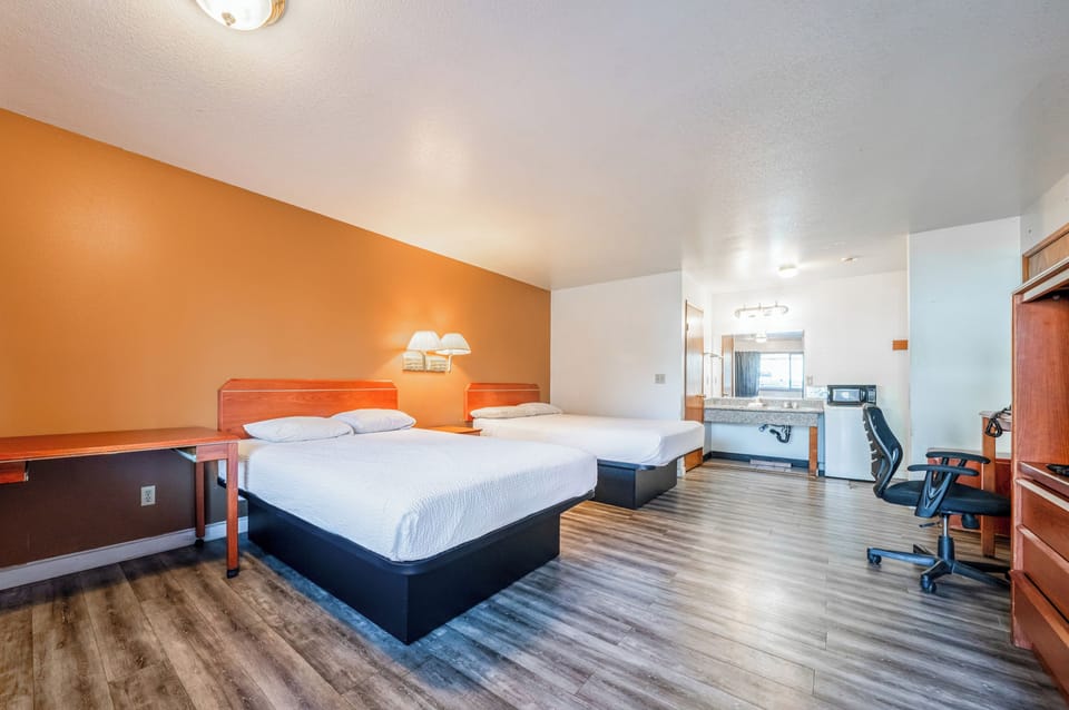 Room, 2 Queen Beds, Non Smoking | Desk, iron/ironing board, free WiFi, bed sheets