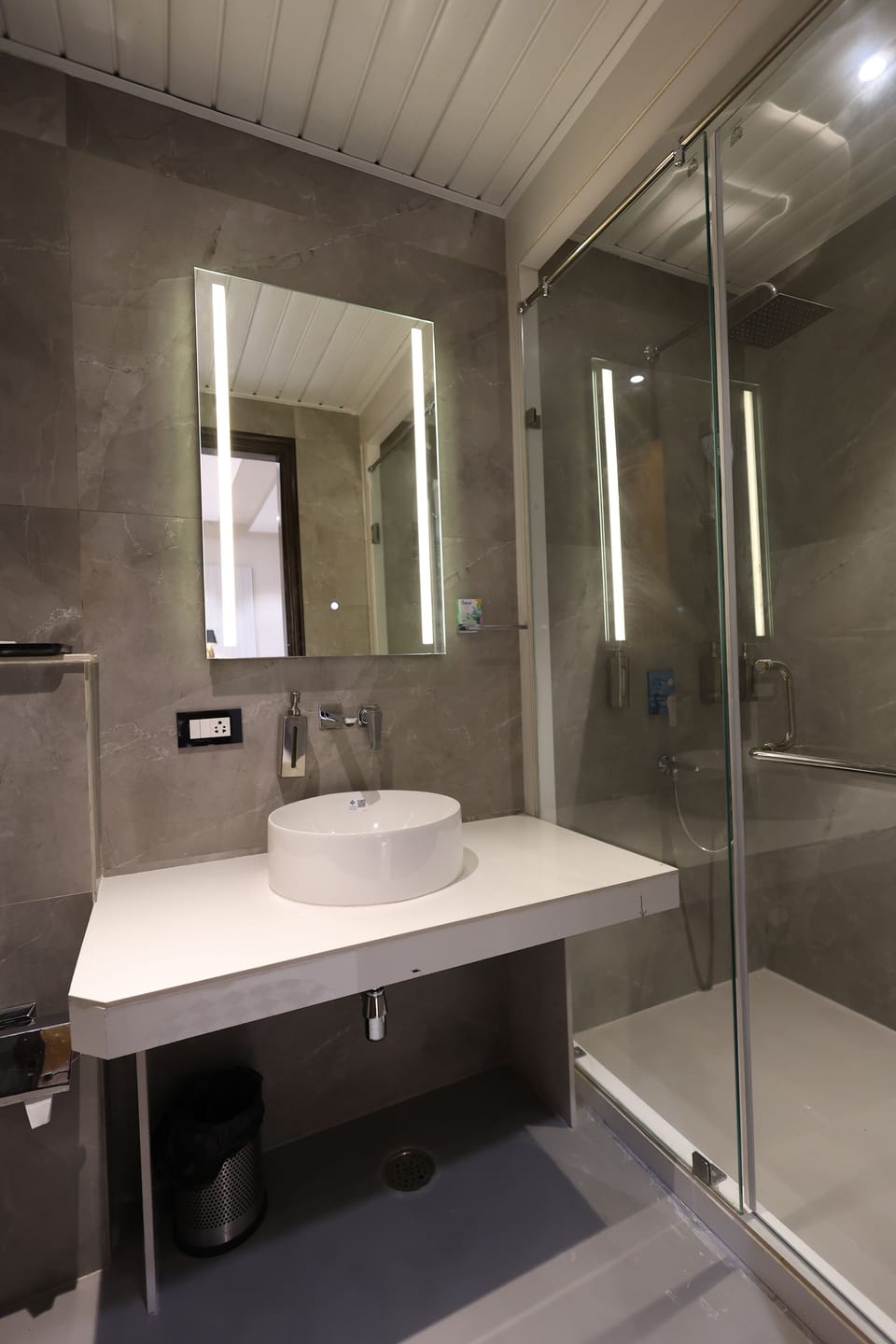 Shower, slippers, towels, soap