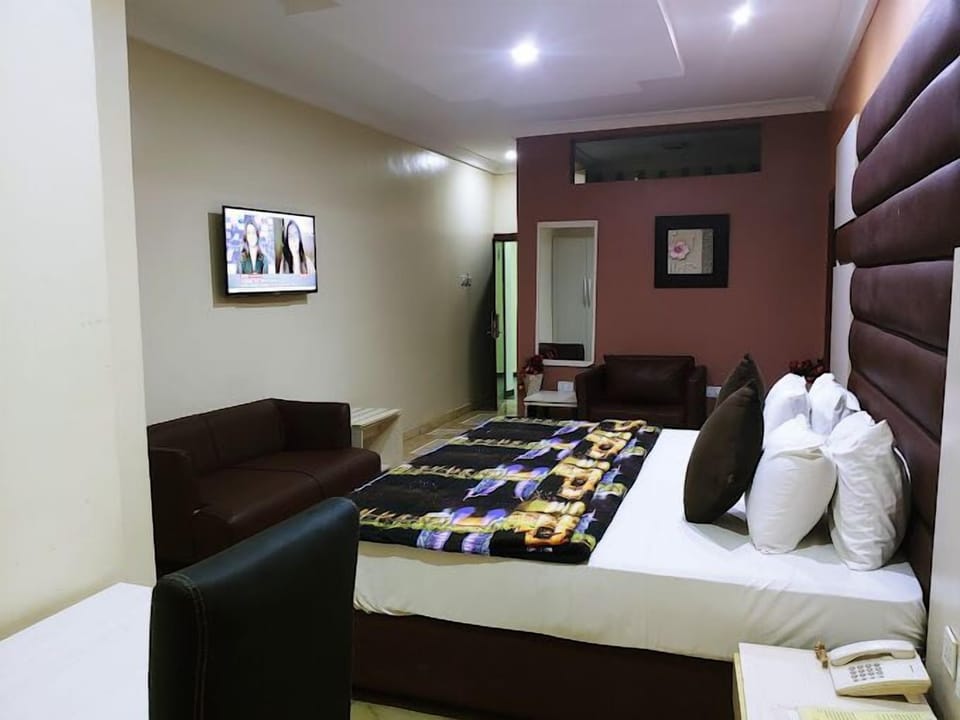 Deluxe Room, Balcony, City View | Desk, laptop workspace, free WiFi