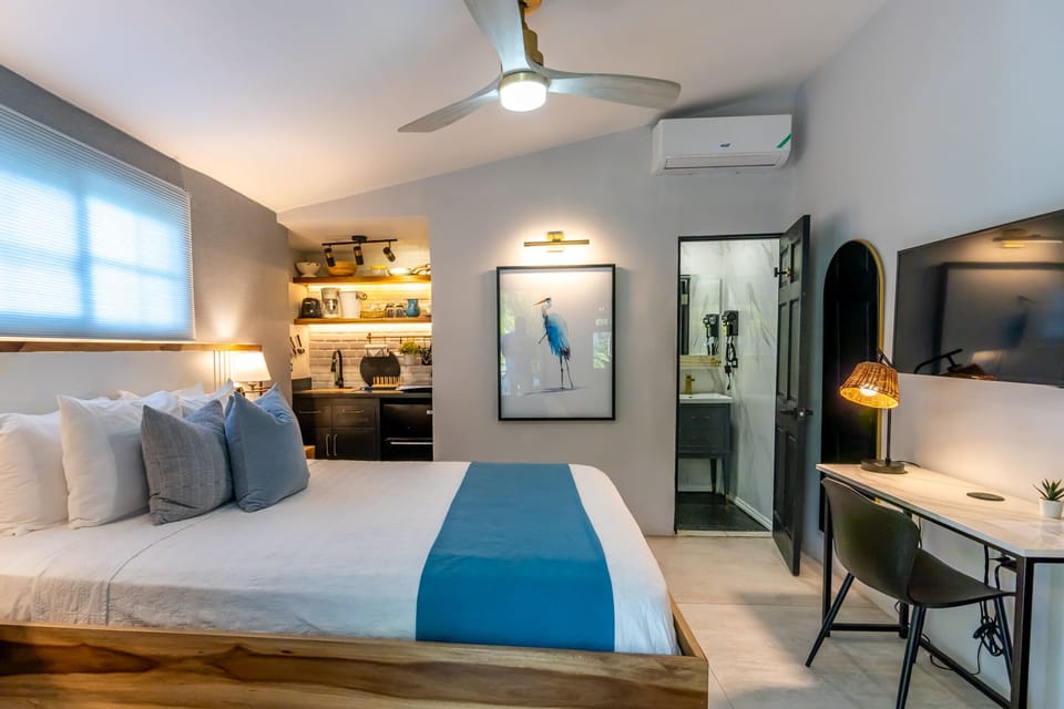 Signature Cottage, 1 Queen Bed, Non Smoking | In-room safe, iron/ironing board, WiFi (free), bed sheets
