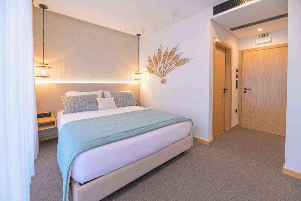Deluxe Double Room, Courtyard View | In-room safe, desk, laptop workspace, soundproofing