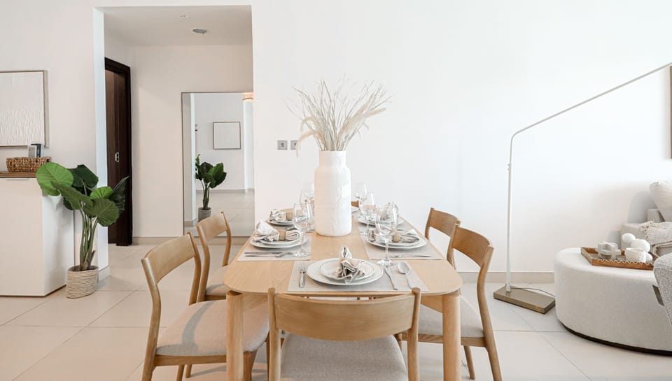 Deluxe Apartment, Balcony, Sea View | Living area | 55-inch Smart TV with cable channels