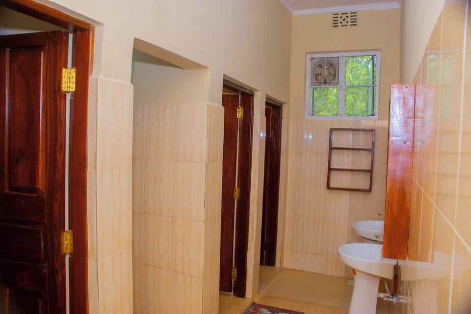 Comfort Triple Room | Bathroom | Shower, slippers, towels, soap