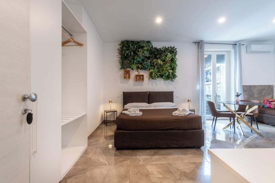 Family Quadruple Room, Balcony, Courtyard View | Hypo-allergenic bedding, down comforters, memory foam beds