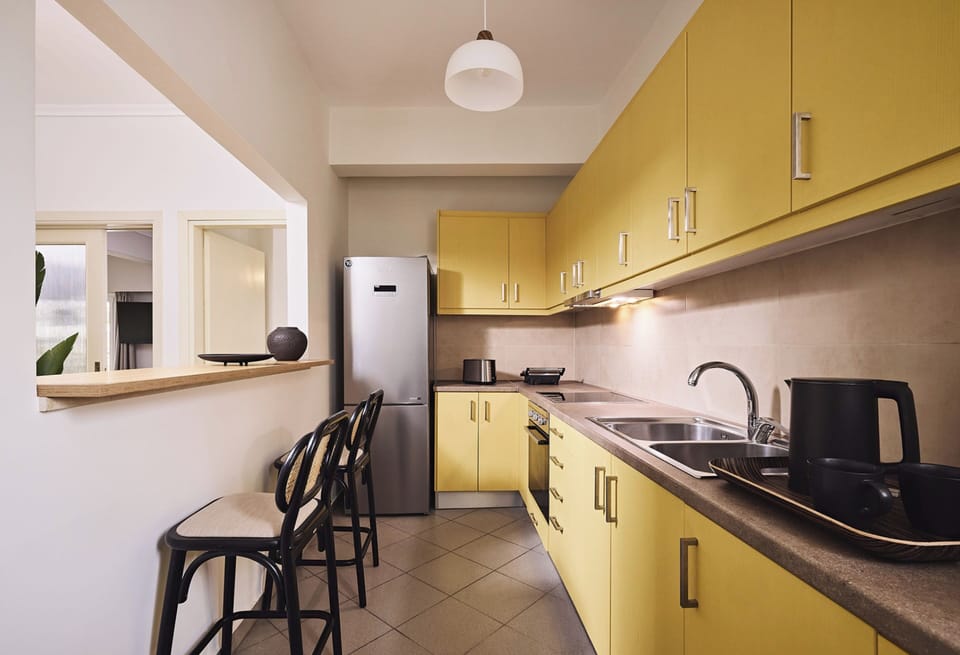Executive Apartment, Balcony, City View | Private kitchen | Espresso maker, coffee/tea maker, electric kettle, toaster