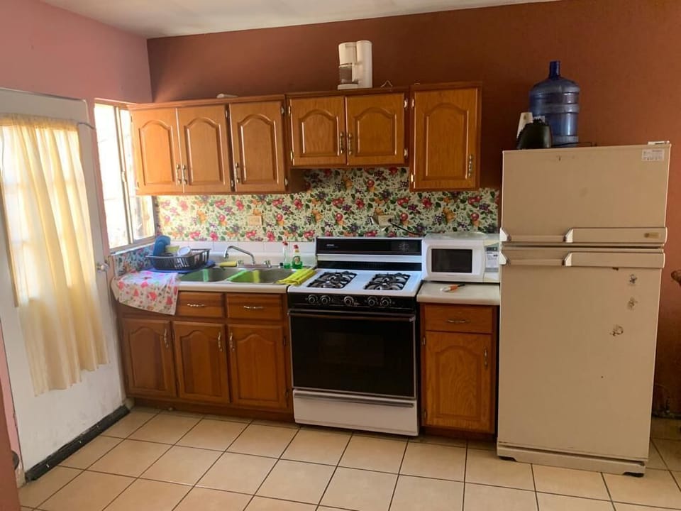 Fridge, microwave, oven, cookware/dishes/utensils