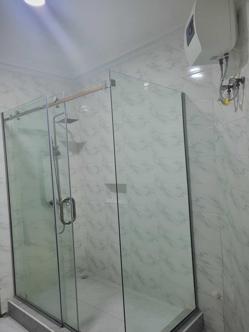 Shower, towels, soap, shampoo