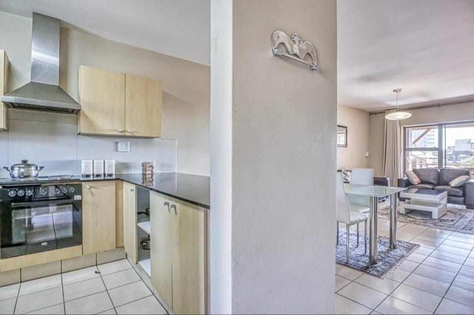 Deluxe Apartment | Living area | Flat-screen TV