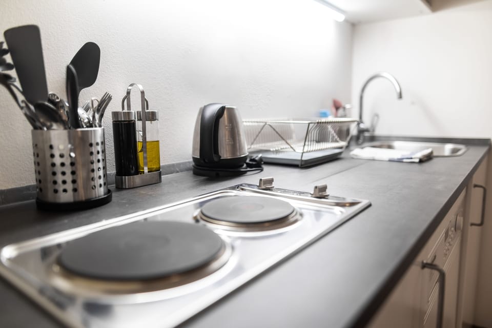 City Apartment, 2 Bedrooms, City View | Private kitchenette | Shared fridge, microwave, stovetop, highchair