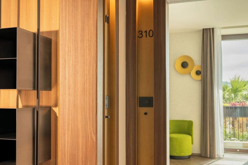 Family Apartment, Sea View | Minibar, in-room safe, blackout drapes, soundproofing