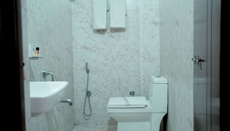 Shower, free toiletries, hair dryer (on request), towels