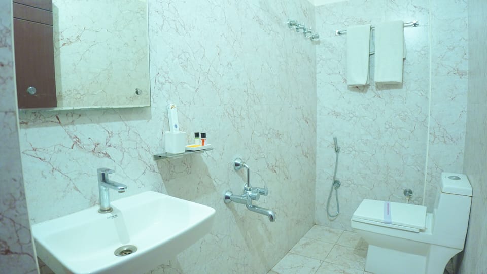 Shower, free toiletries, hair dryer (on request), towels