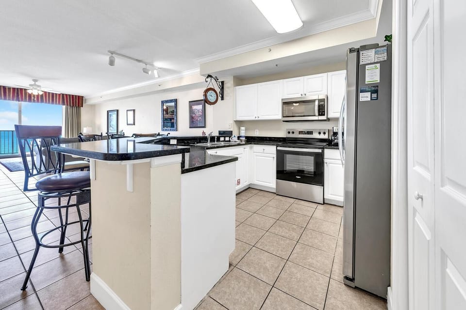 Condo, Multiple Beds (Tidewater 1902) | Private kitchen | Oven, toaster