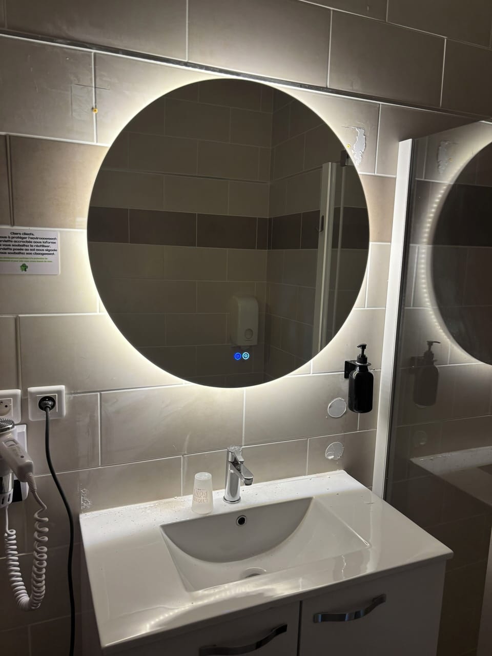 Room with a large bed | Bathroom | Hair dryer, towels, soap, shampoo