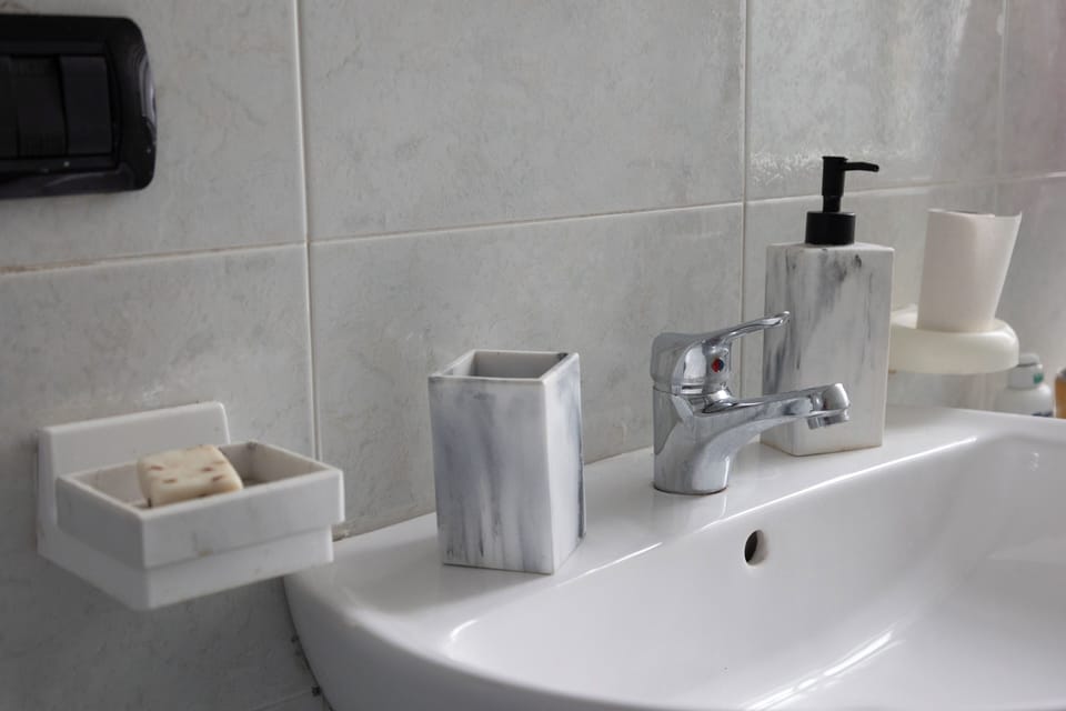 Apartment, 1 Bedroom, Balcony | Bathroom | Shower, hair dryer, towels, toilet paper