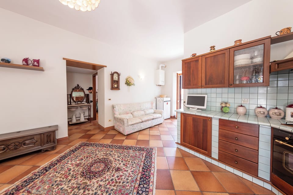 Apartment, 2 Bedrooms, Balcony | Living area | Flat-screen TV