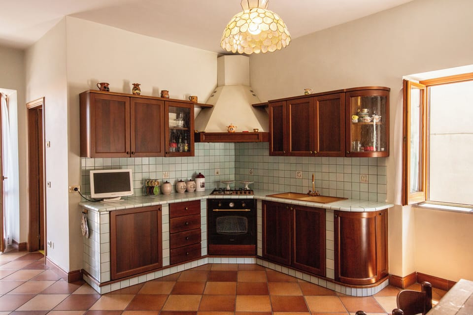Apartment, 2 Bedrooms, Balcony | Private kitchen | Fridge, oven, stovetop, cookware/dishes/utensils