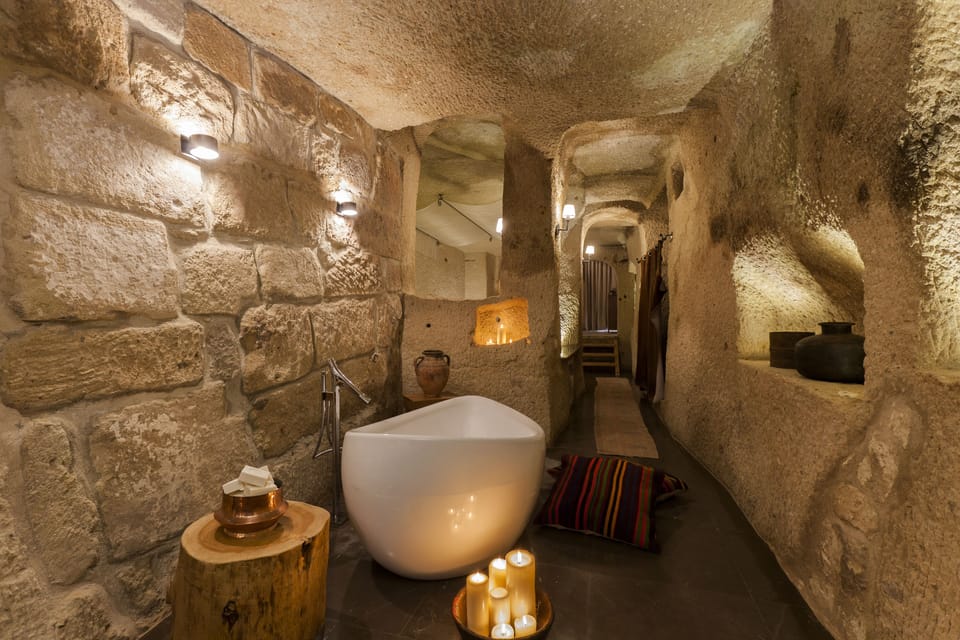 Chapelle King Suite | Bathroom amenities | Deep soaking tub, hair dryer, bathrobes, slippers