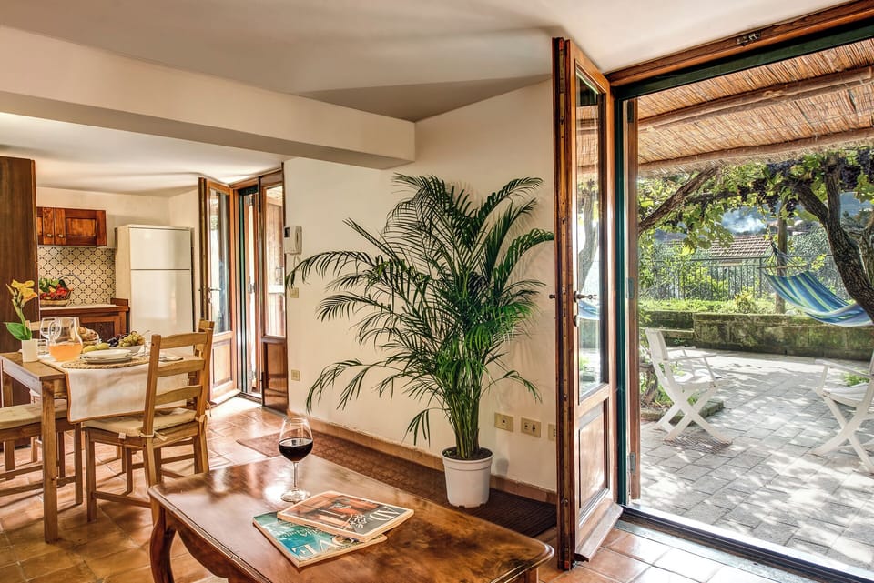Villa, Sea View | Living area | 32-inch TV with cable channels, foosball, books
