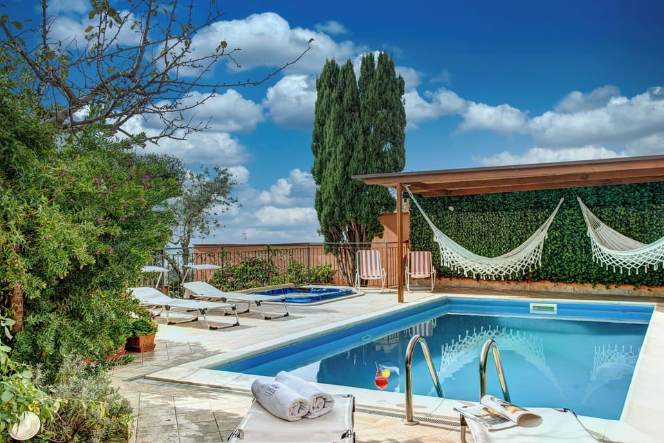Seasonal outdoor pool, pool umbrellas, sun loungers