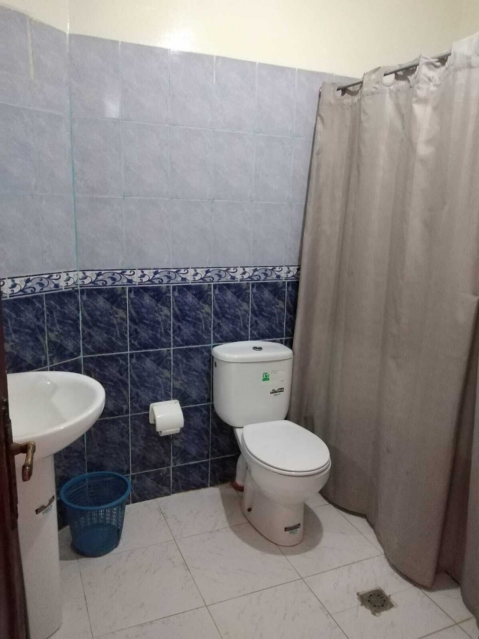 Shower, towels, soap, toilet paper