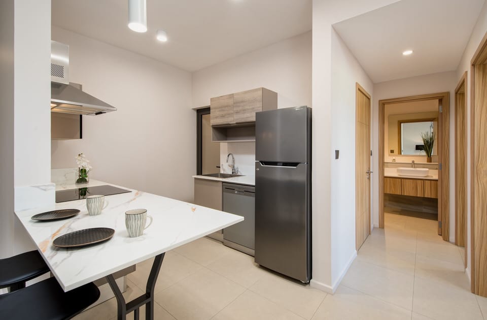 Two-Bedroom Apartment | Private kitchen | Shared fridge, shared microwave