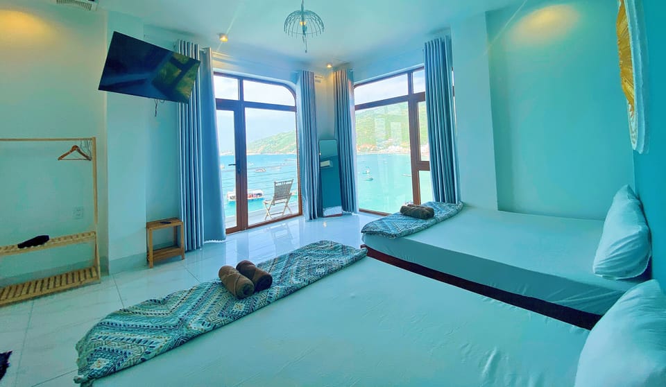 Family Room, Sea View | Desk, iron/ironing board, free WiFi, bed sheets