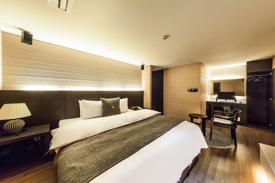 Royal Suite (Extra fee applies for 2+ consecutive nights stay) | Down comforters, memory foam beds, soundproofing, free WiFi